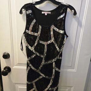 Elegant Black Mini Dress with Silver Accents